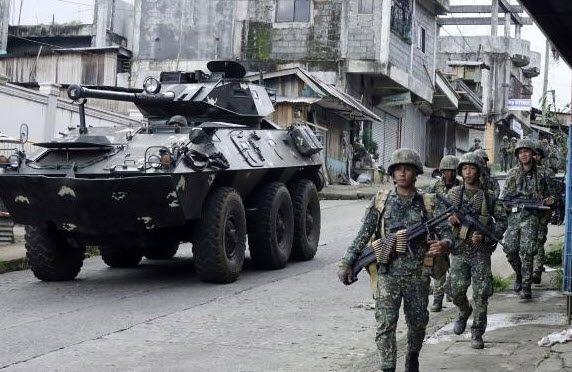 Philippines military: 16 bodies found were civilians fleeing militants