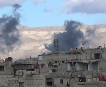 قصف عنيف بغوطة دمشق ومعارك بريف إدلب