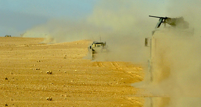تنسيق أمني بين الجيشين العراقي والسوري ضد "داعش"